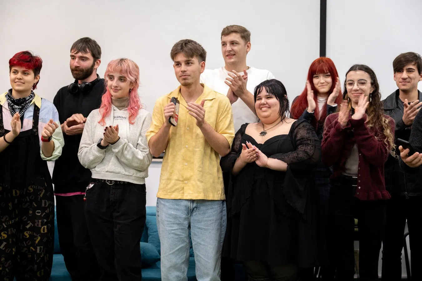 Students applauding at an event