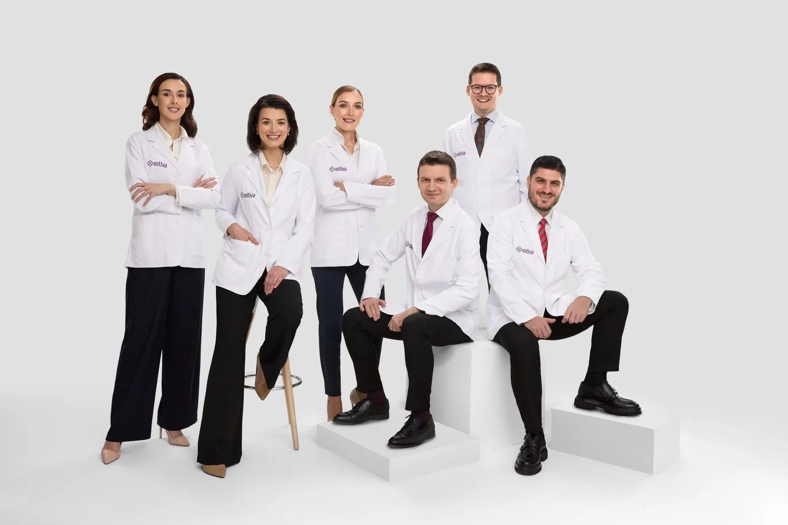 The Elithia doctors in white coats