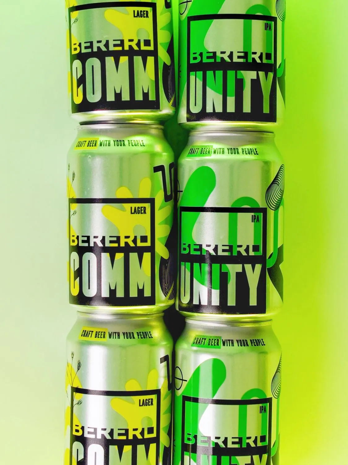 A tower of COMM and UNITY cans