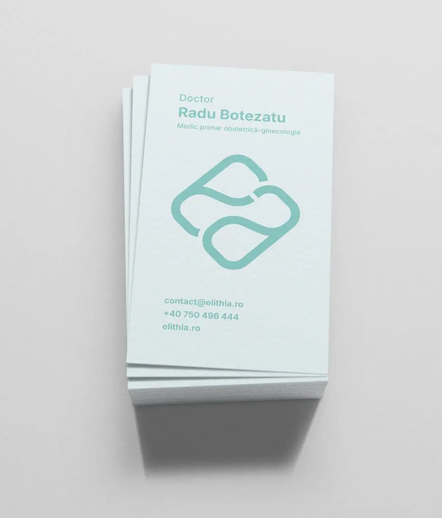 A doctor's business card in teal