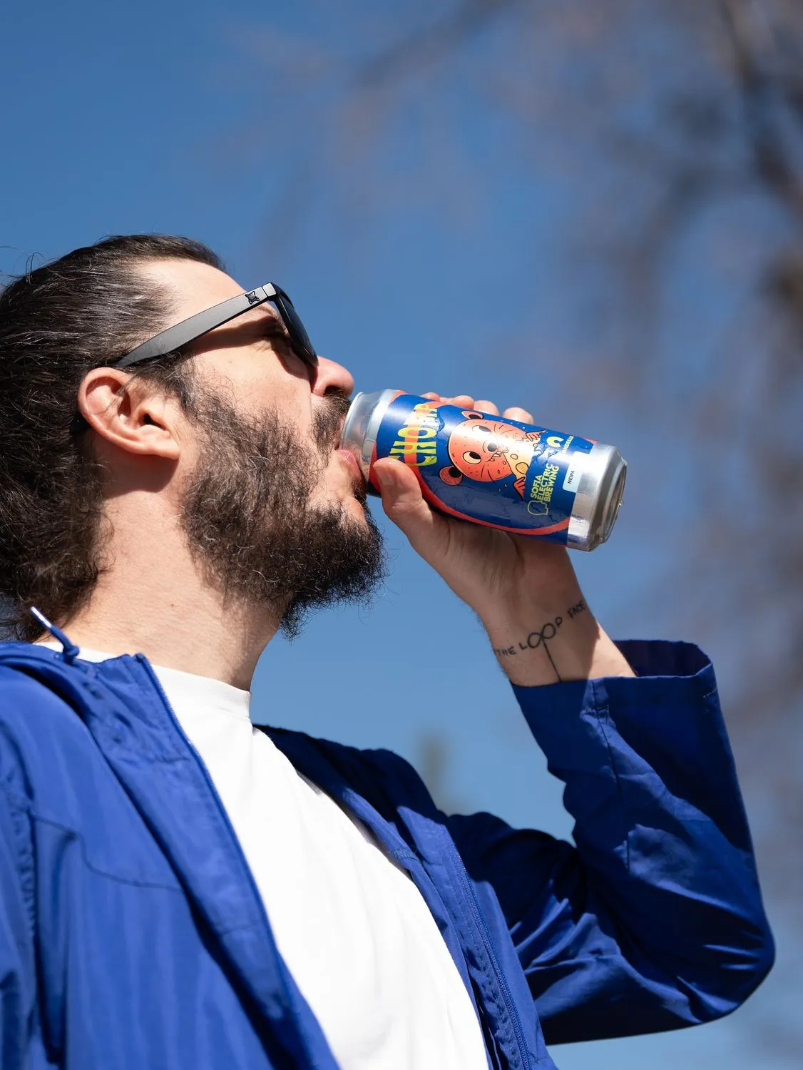 Drinking a can in the sun