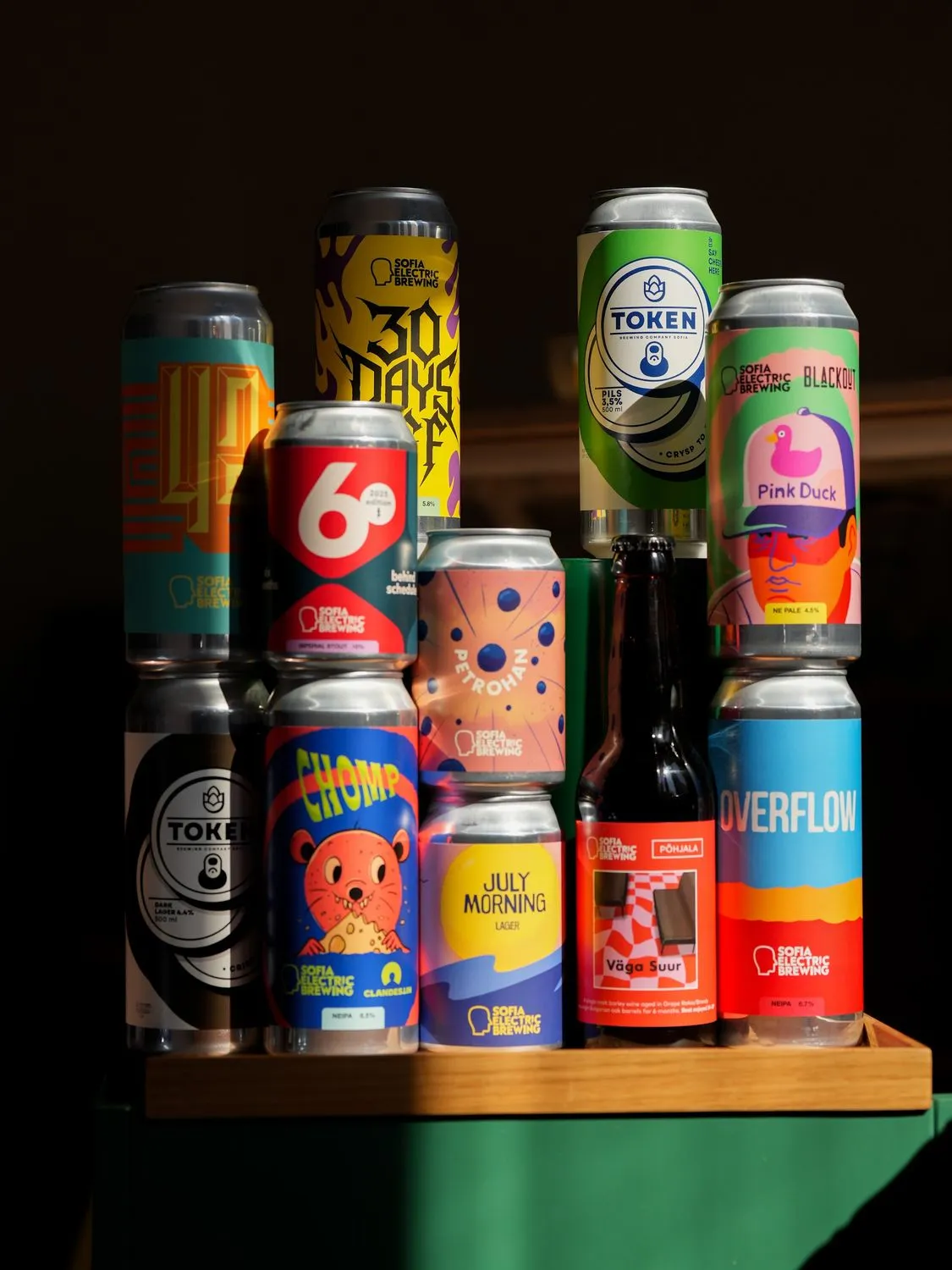 A stack of colourful craft cans