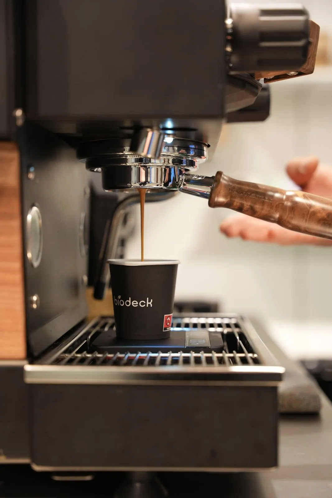 An espresso shot running into a cup