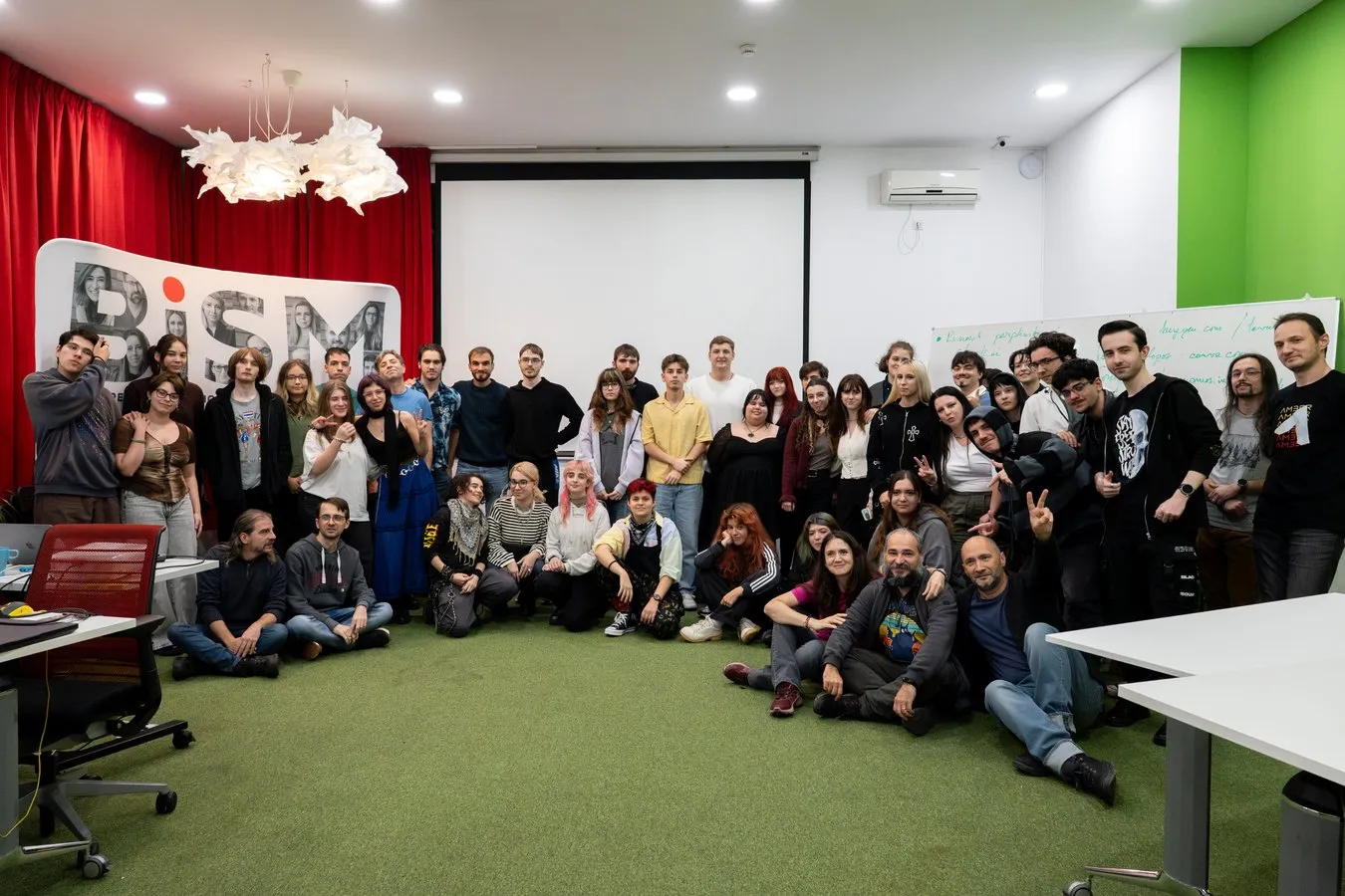 A large group photo of students and lecturers