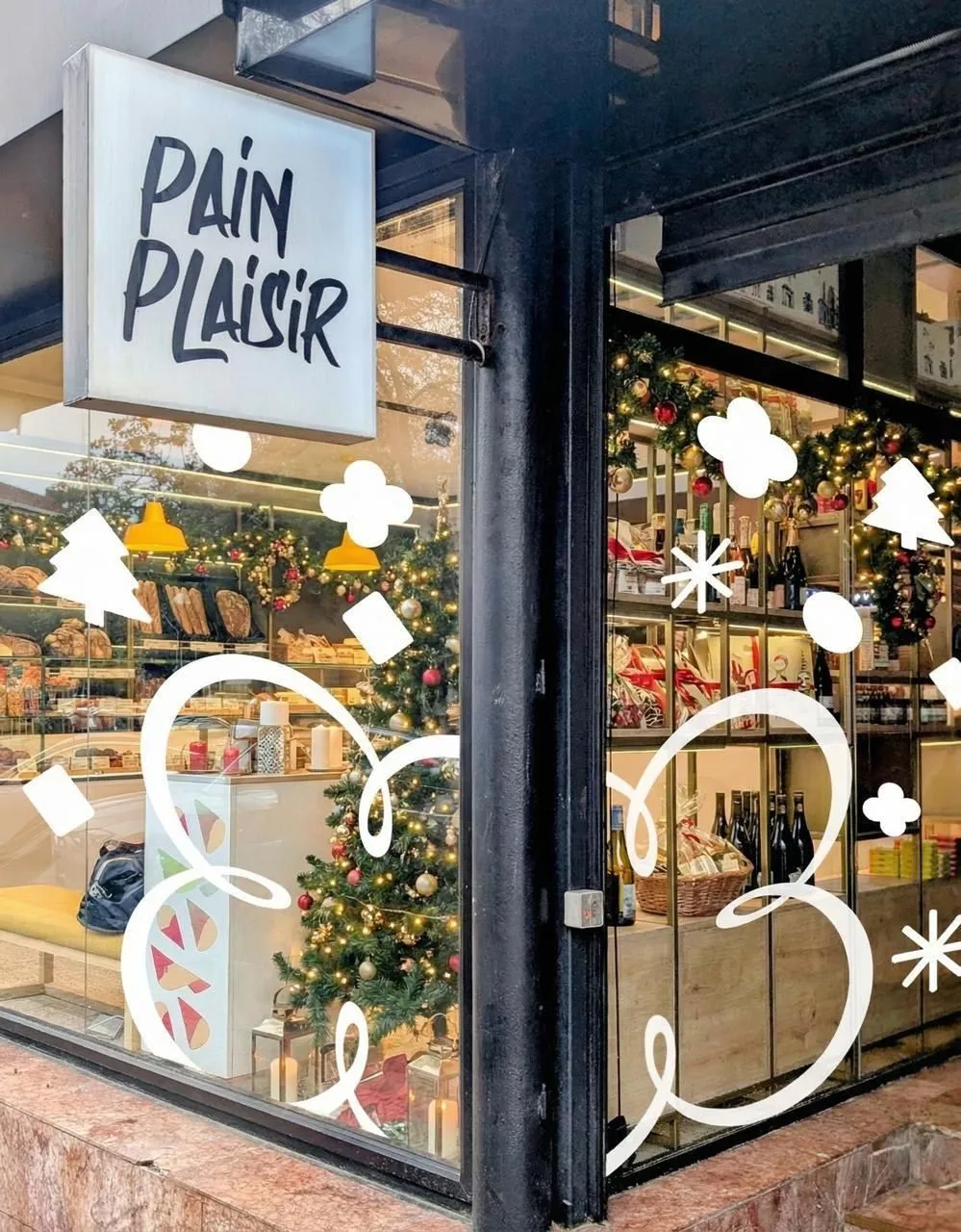 Shop window with white anemone graphics