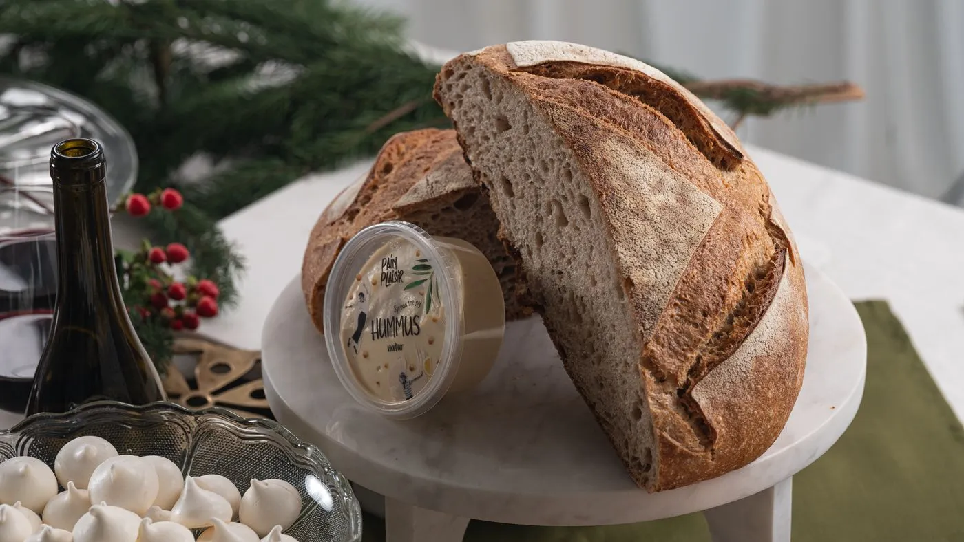 Sourdough loaf and cheese at the Christmas table