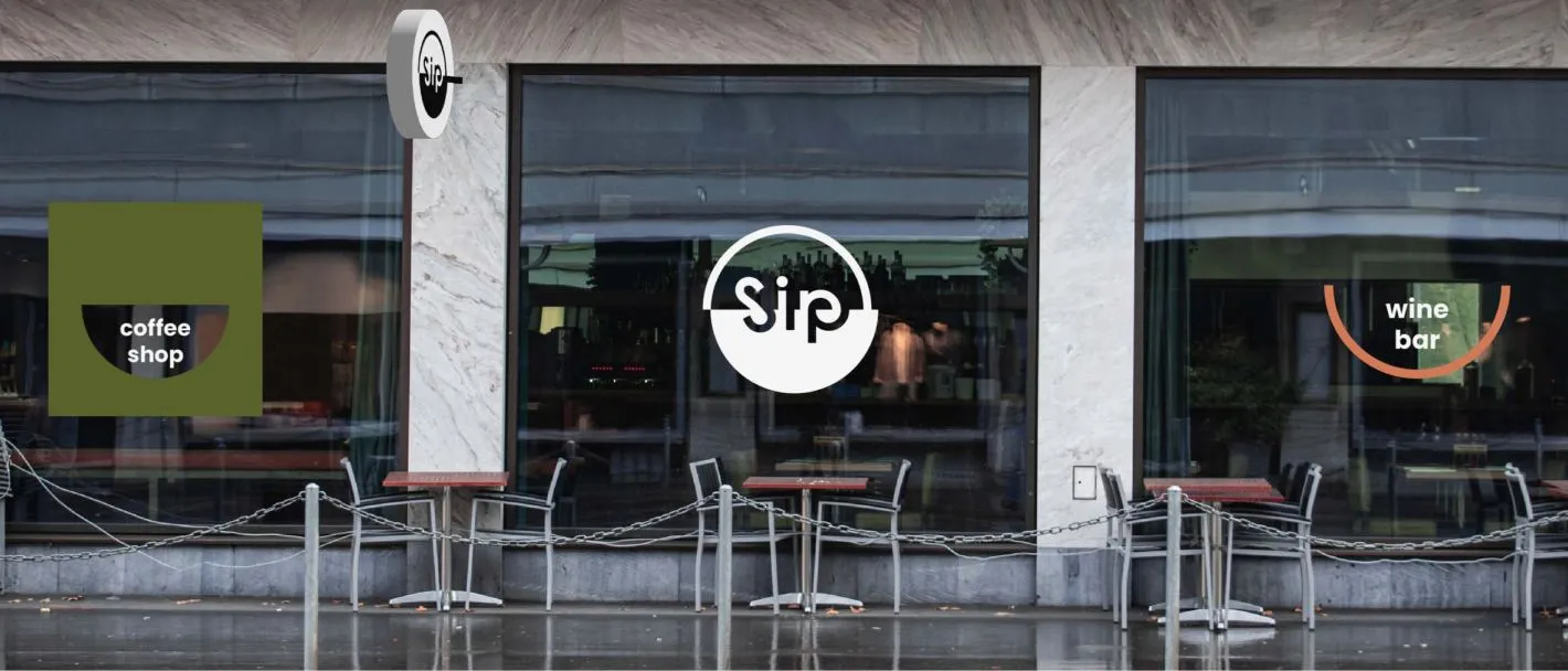 The Sip storefront: coffee shop on one side, wine bar on the other