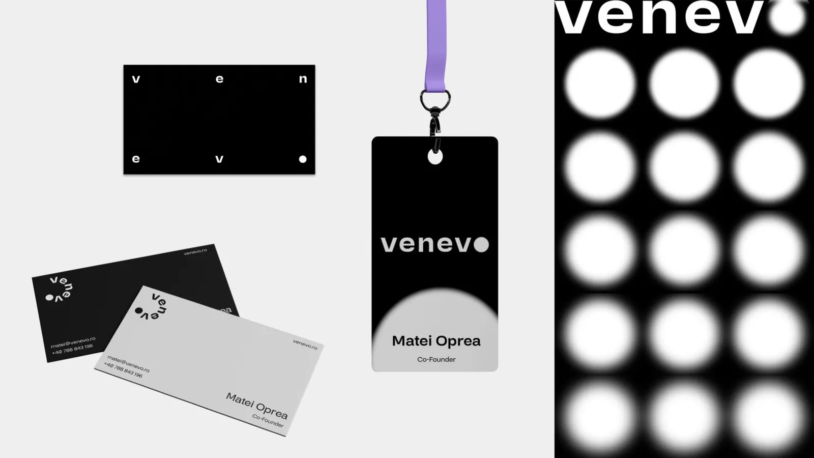 Black and grey business cards, a lanyard badge and a poster of blurred white dots