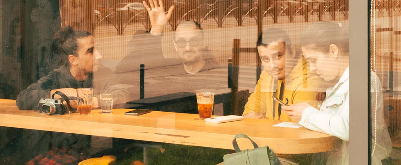 Guests seen through the shop window