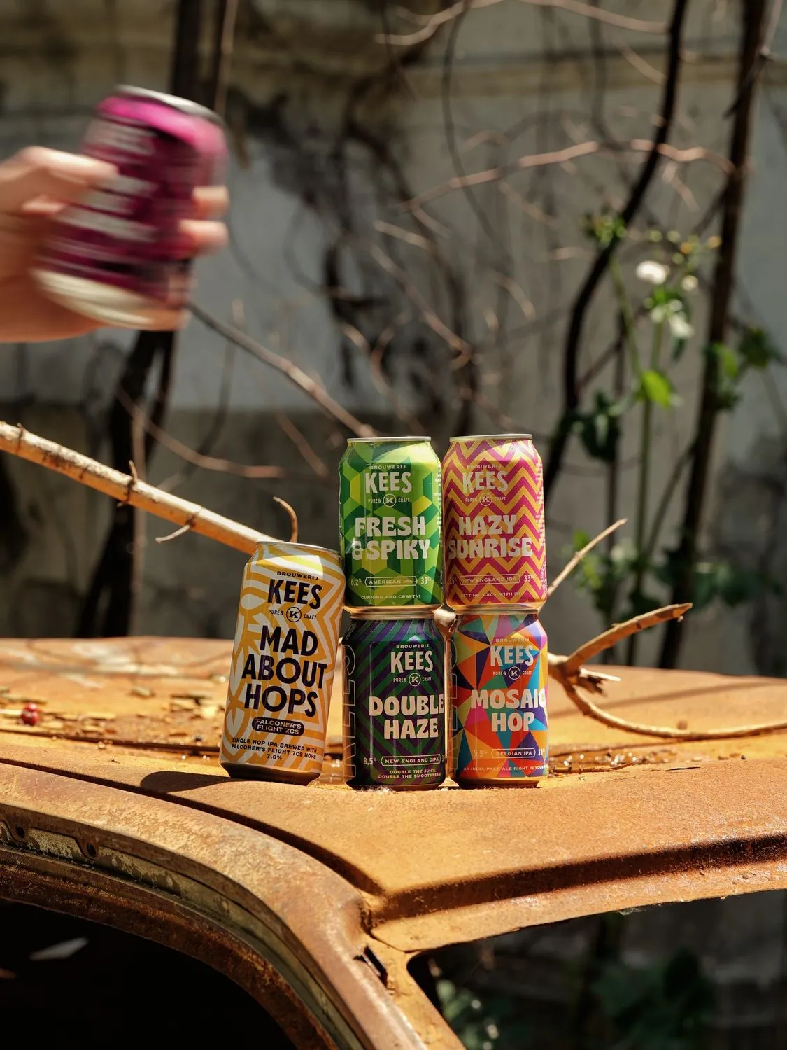 Craft cans on the roof of a rusted car